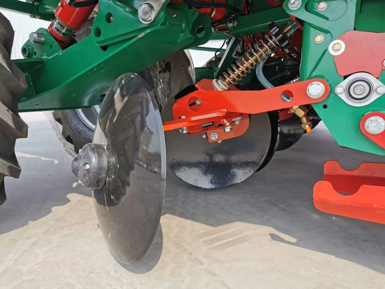 soil-covering disc component of a large trailed potato planter